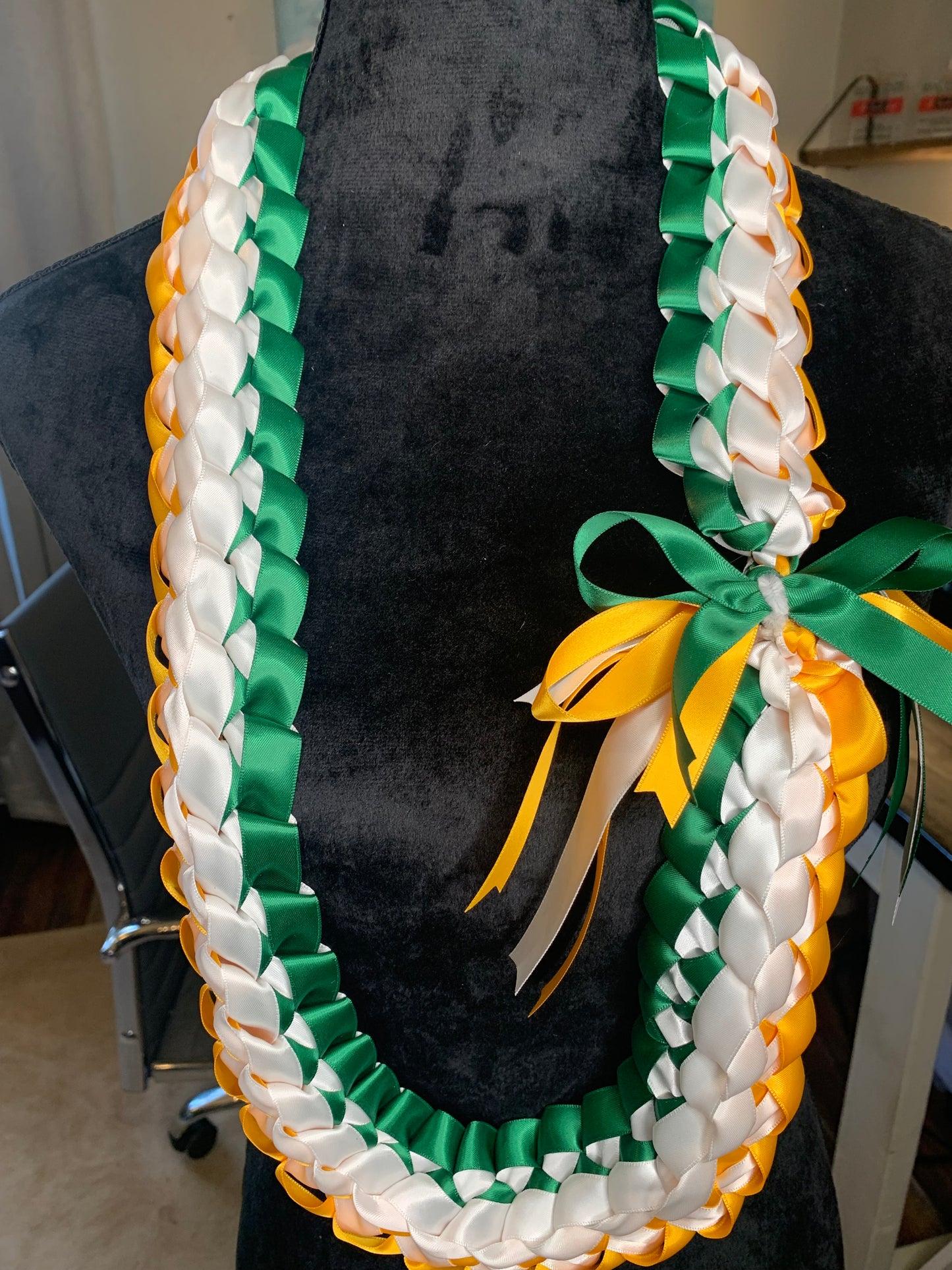 This Lei can be personalized to your liking. The listed price includes graduate year, name and a bow.